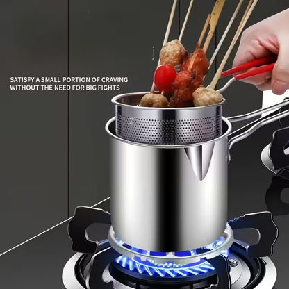 Friteuse en acier inoxydable avec panier.